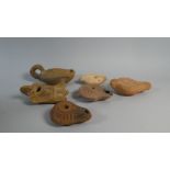 A Collection of Six Ancient Roman Terracotta Oil Lamps.