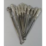 A Collection of Ten Silver Mounted Button Hooks
