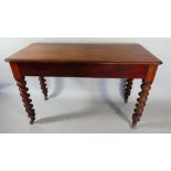 A Victorian Mahogany Rectangular Side Table with Barley Twist Supports.