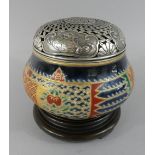 A Good Quality Japanese Ceramic Potpourri with Pierced and Etched White Metal Top.