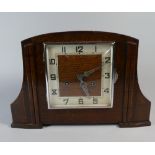 An Oak Art Deco Mantle Clock with Eight Day Movement,