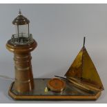 A Novelty Table Lamp in the Form of Sailing Boat and Light House, On Rectangular Plinth Base,