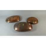 A Set of Three 19th Century Copper Bed Warming Pans
