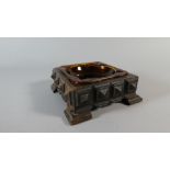 A Square Tramp Art Ashtray, with Amber Glass Liner,