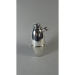 An Edwardian Chromed Cocktail Shaker with Side Pourer,