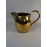 A Large Brass Jug,