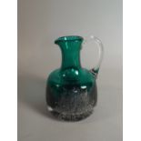 A Heavy Green Glass Jug with Bubble Decoration,