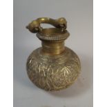 An Indian Brass Pot Decorated in Relief with Flowers and Having Cobra Handle,