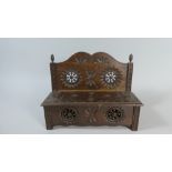 An Edwardian Carved and Pierced Wooden Box in The Form of A Settle,
