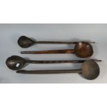 A Collection of Four Carved African Wooden Spoons