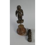 A Carved Wooden Figure together with A Far Eastern Figure on Later Circular Plinth