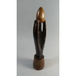 A Carved Wooden Study of Hand Holding Egg,