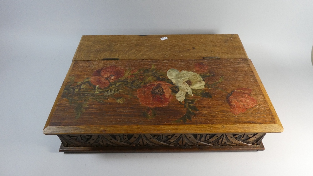 A Painted and Carved Oak Bible Box Decorated with Roses,