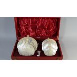 A Cased Collection of Carved Mother of Pearl Shells Decorated with Religious Scenes to Include Last