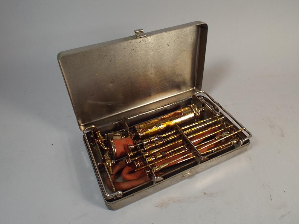 A WWI Military Metal Cased Surgical Transfusion Syringe Set