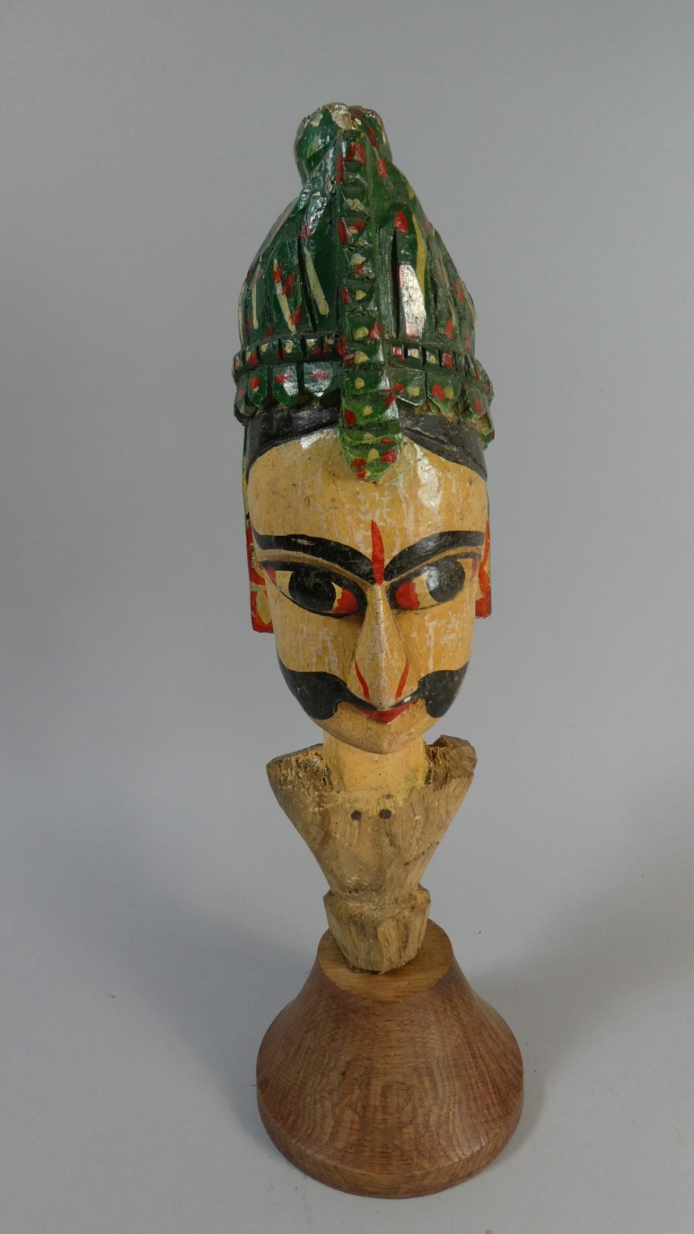 An Indian Painted Puppet Head In Carved Wooden On Later Turned Stand,