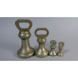 A Collection of Four Graduated Bell Weights