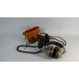 A Pair of Vintage Koss Headphones and A Pair of Leather Cased 8 x 30 Binoculars
