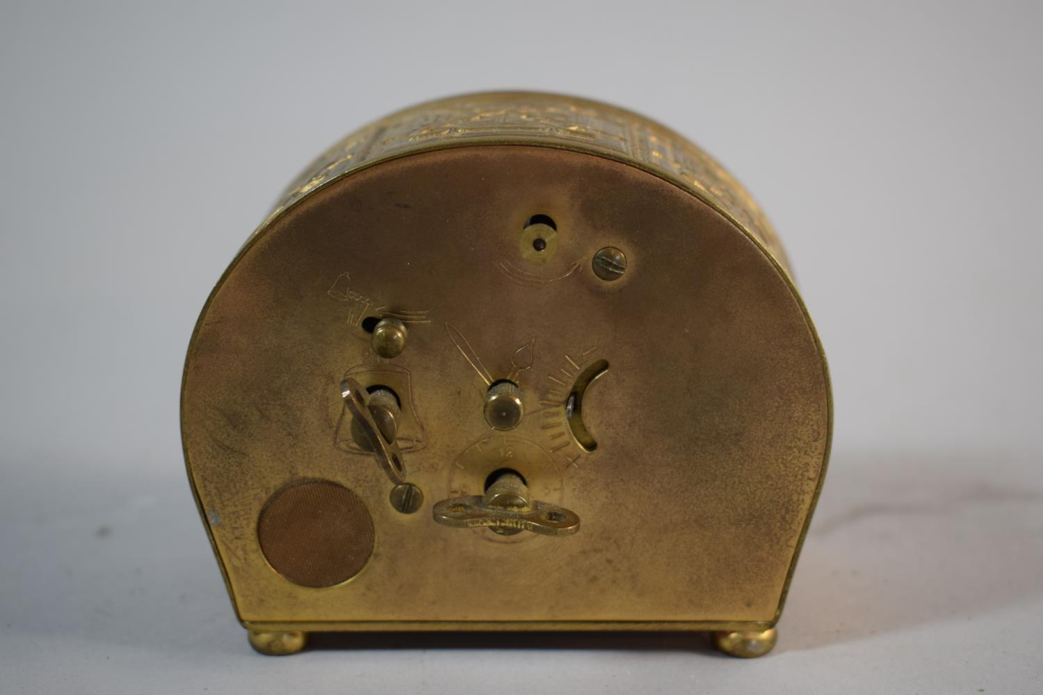 A Mid 20th Century Brass Alarm Clock with Body Decorated in Relief, Fingers Loose, Cracked Glass and - Image 3 of 3