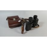 A Pair of Leather Cased Noctovis II, 8x30 Binoculars