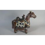 An Oriental Glazed stoneware Study of a Horse, 25cm