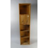 A Late 20th Century Pine Bookcase with Centre Cabinet, Having Paper Label Verso for Broadmere