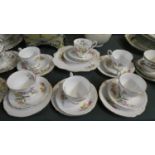 A Royal Stafford Tea Rose Part Teaset Comprising Six Trios and a Cake Plate