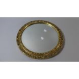 A Circular Pierced Gilt Framed Wall Mirror with Bevelled Glass, 36cm Diameter