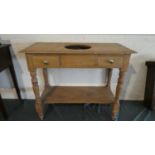 A Pine Wash Stand Table with Two Drawers Having Brass Handles, Centre Cut Out for Wash Basin and