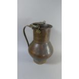 A Large North African Copper Water Ewer with Brass Handles, 39cm High