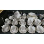 A Large Collection of Paragon Victoriana Rose Tea and Dinnerwares to Include Six Trios, Teapot,