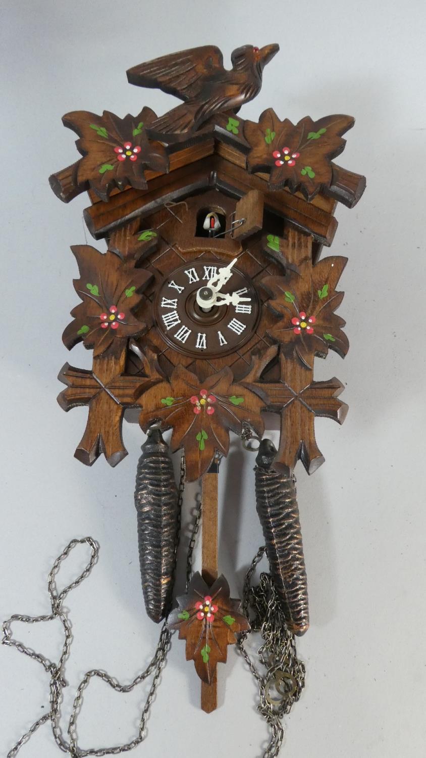 A 20th Century Black Forest Wall Hanging Cuckoo Clock