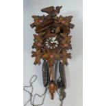 A 20th Century Black Forest Wall Hanging Cuckoo Clock