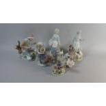 A Collection of Six Spanish Figural Ornaments to Include Three Lladro, One Nao and Two Other