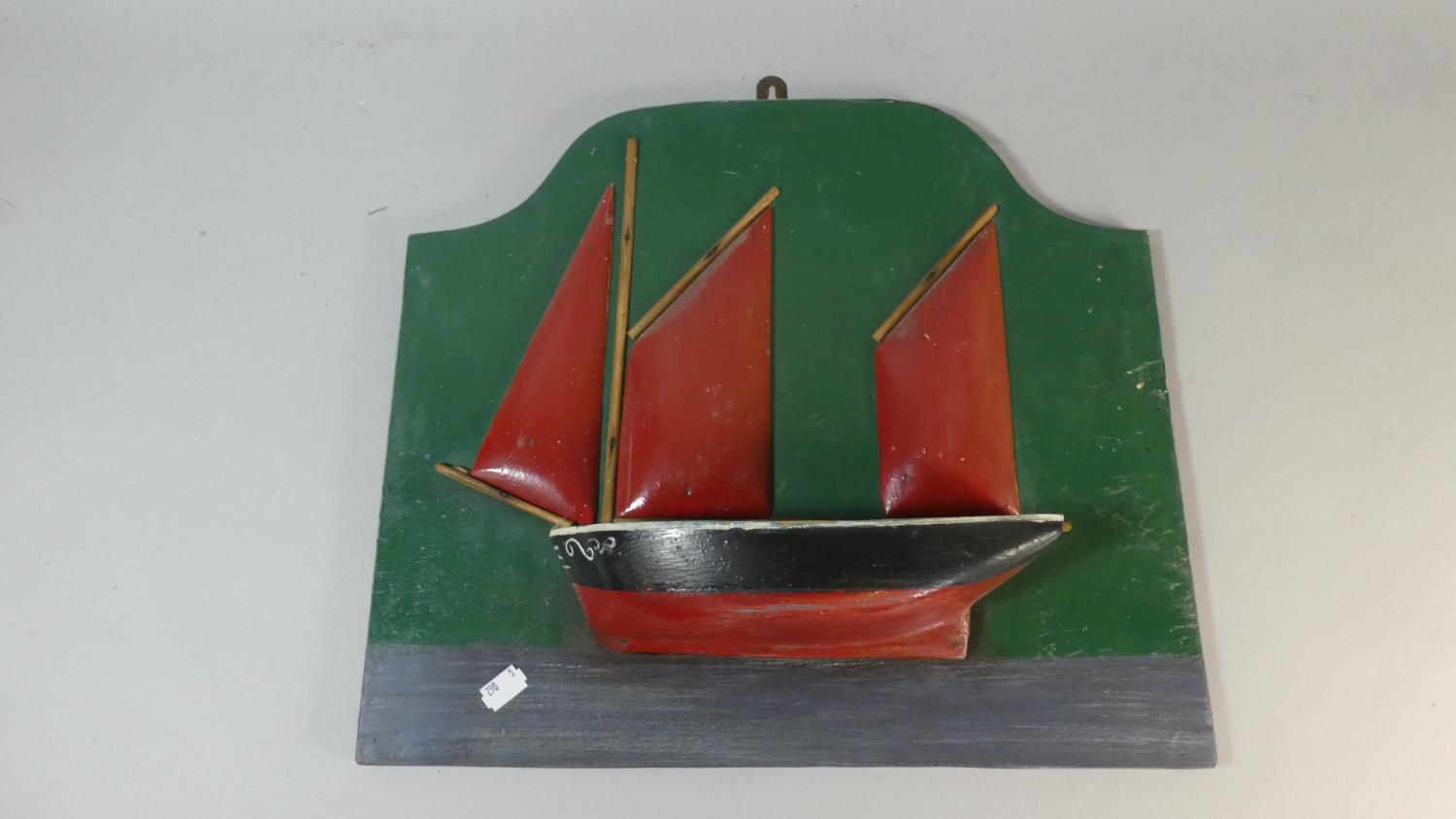 A Framed Folk Art Half Model of a Fishing Boat in Full Sail, 40cm High