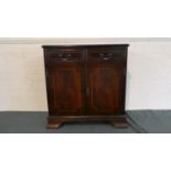 A Mahogany Side Cabinet with Two Drawers Over Cupboard Base, 76cm Wide