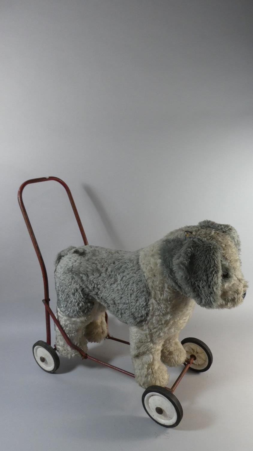 A Vintage Push Along Dog Toy