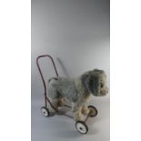 A Vintage Push Along Dog Toy