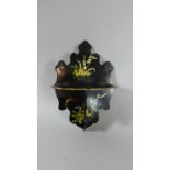 A Folding Black Lacquer Wall Mounting Shelf with Hand Painted Floral Decoration, 27cm High