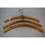 A Collection of Three Advertising Coat Hangers For J N Edwards and Wilson and Sons