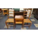 A Pair of Cane Seated Ladder Back Bedroom Chairs and a Small Sewing Table