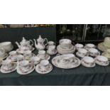 A Collection of Royal Albert Lavender Rose Tea and Coffeewares to Include Six Trios, Coffee Pot,