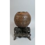 An Indian Carved Coconut Shell Set on Plinth Base in the Form of Three Elephants, 23cm High