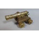 A Brass and Wooden Model of a Ship's Cannon, 19.5cm Long