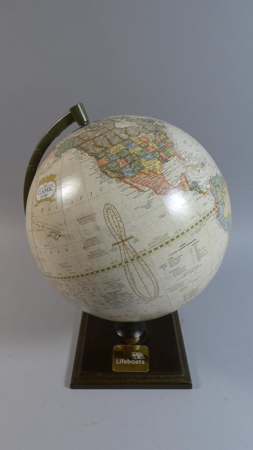 A Cram Classic American Table Globe on Wooden Stand with Brass Plaque Inscribed "Lifeboats", 33cm