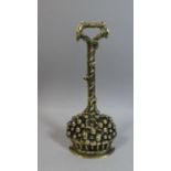 A 19th Century Brass Door Porter in the Form of Basket on Fruit, 36cm High