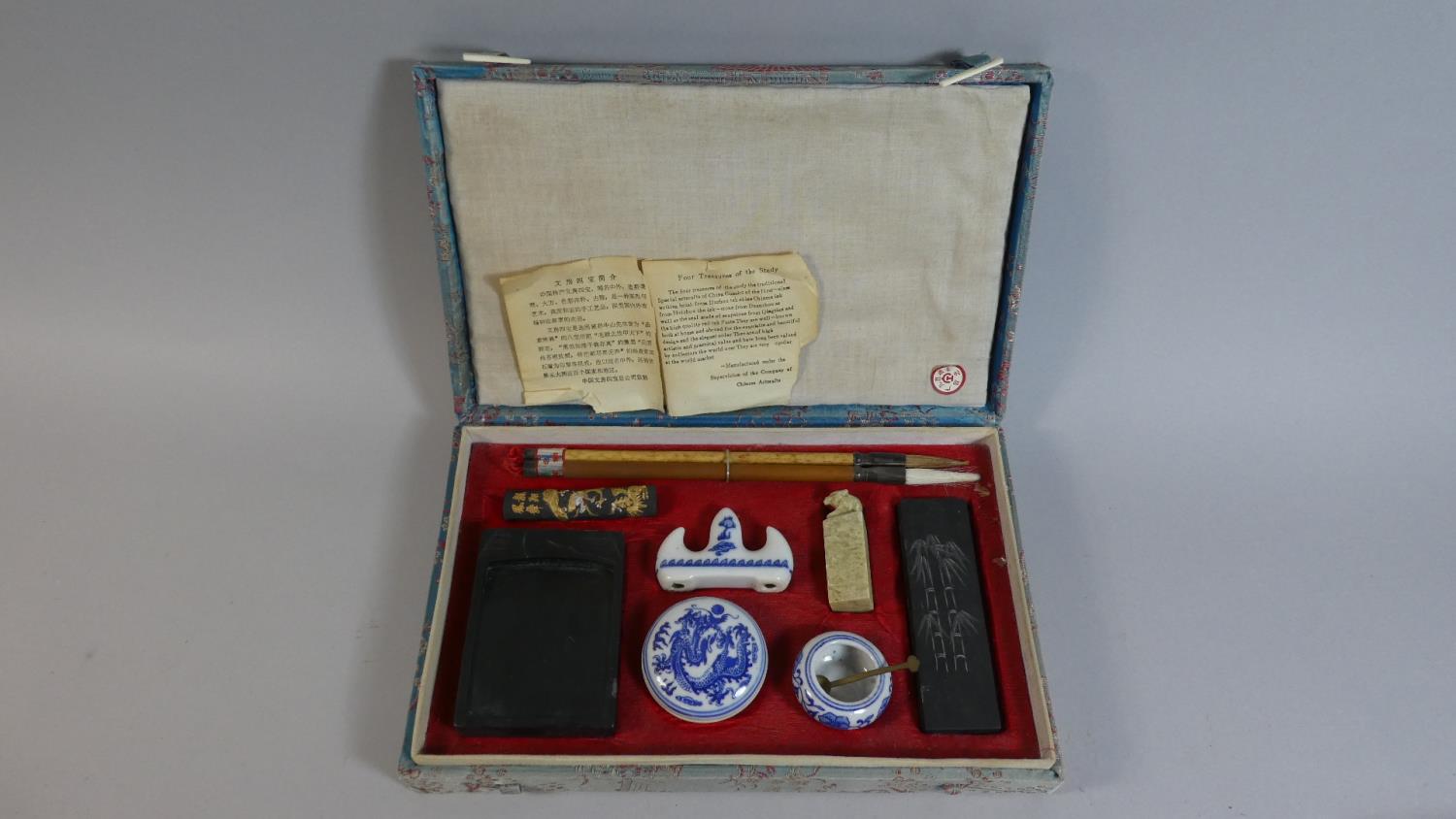 A Cased Chinese Writing Set to Include Writing Brushes, Ink, Seal etc