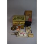 A Vintage Tin Containing Curios to include 1950's Mascot ASB Powder Compact and Cigarette Case