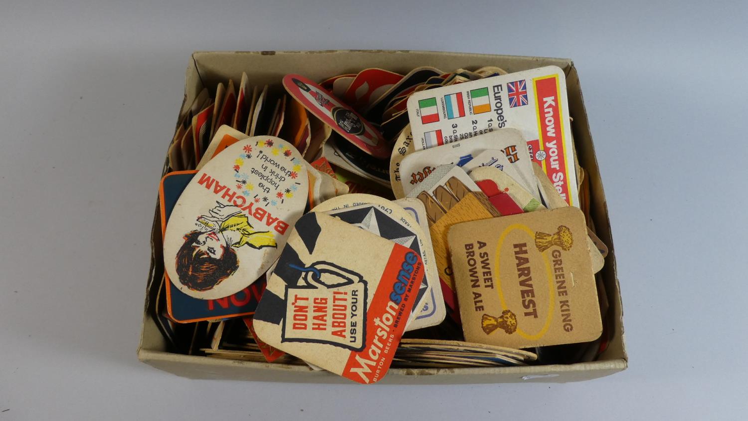 A Box Containing Vintage Beer Mats to Include Babycham, Double Diamond, Shandy Bass Etc