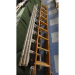 A Triple Extending Aluminium Ladder and a Wooden Loft Ladder